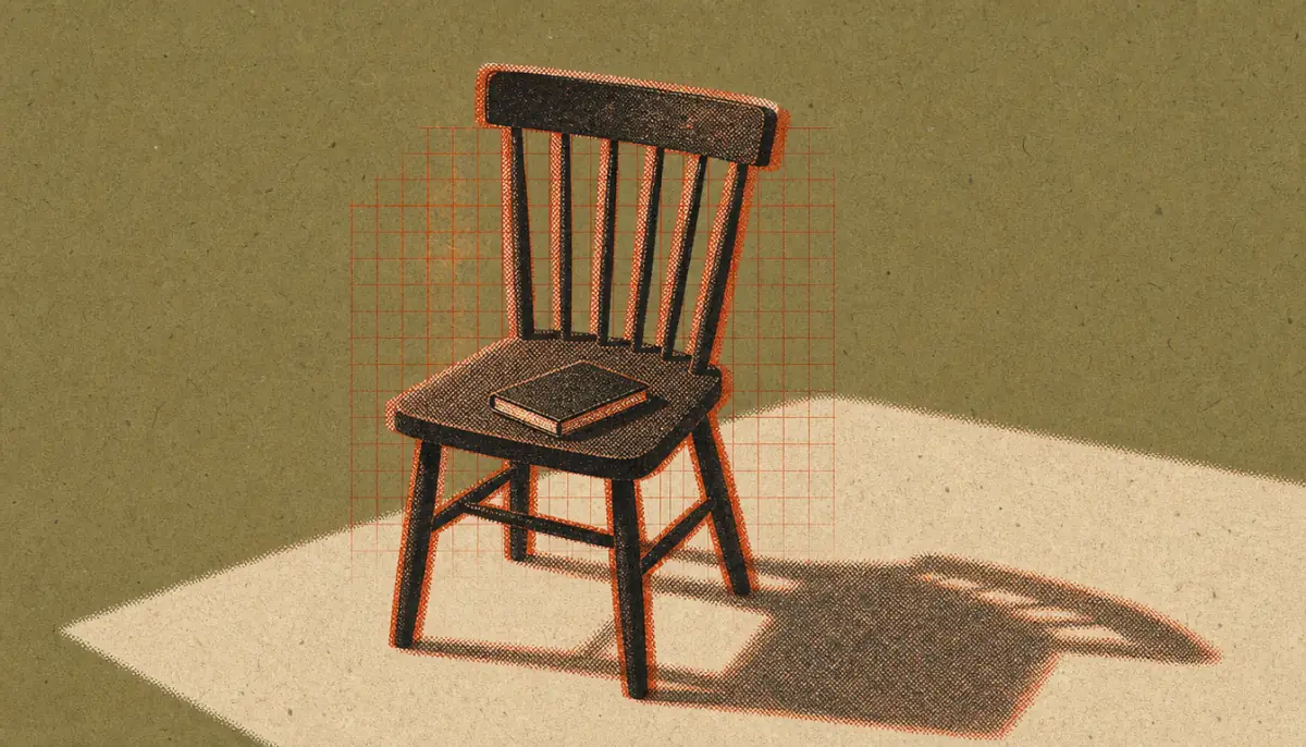 A plain chair and notebook representing the daily premeditatio malorum practice ritual